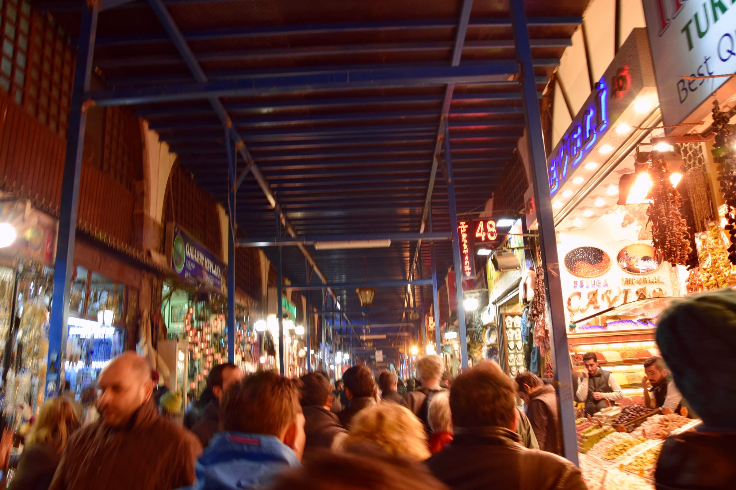 A crowd moving through a lane of the Grand Bazaar in Istanbul.
